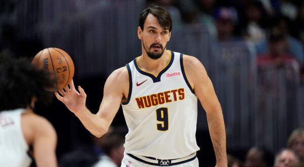 Denver Nuggets forward Dario Saric (9) in the second half of an NBA preseason game Sunday, Oct. 13, 2024, in Denver. (AP Photo/David Zalubowski) Suns Nuggets Basketball