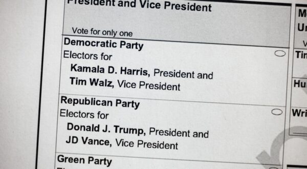 epa11622419 A sample ballot for the 2024 US presidential election on display at the Elana Bozeman Government Center in Arlington, Virginia, USA, 24 September 2024. Early in-person voting sites opened throughout Virginia on 20 September 2024.  EPA/JIM LO SCALZO