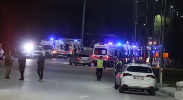 epa11677748 Ambulances arrive as policemen secure the area during a terror attack at (TUSAS) Turkish Aerospace and Aviation Center's headquearter in Ankara, Turkey 23 Ocober 2024. Turkish Interior Minister Ali Yerlikaya announced that four people were killed and 14 were injured in the terrorist attack. Two terrorists were also killed by security forces following an explosion at the headquarters of the Turkish aviation firm close to Ankara.  EPA/NECATI SAVAS