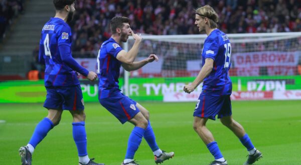 15.10.2024., Nacionalni stadion PGE, Varsava, Poljska - UEFA Liga nacija, Liga A, skupina 1, 4. kolo, Poljska - Hrvatska. Nogometasi Hrvatske slave pogodak Borne Sose za izjednacenje 1:1. Petar Sucic, Borna Sosa Photo: Jacek Szydlowski/Forum/PIXSELL