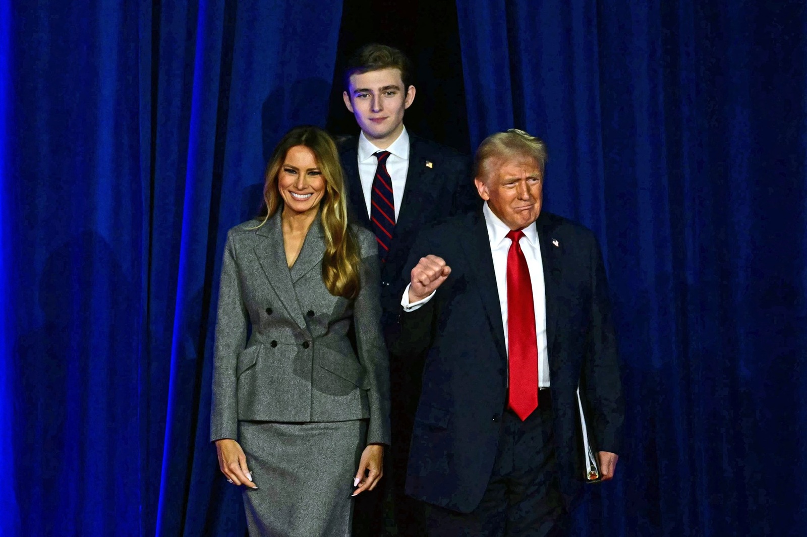 Former US President and Republican presidential candidate Donald Trump (R) arrives for  an election night event alongside former US First Lady Melania Trump and his son Barron Trump at the West Palm Beach Convention Center in West Palm Beach, Florida, on November 6, 2024.,Image: 931001090, License: Rights-managed, Restrictions: , Model Release: no, Credit line: Jim WATSON / AFP / Profimedia