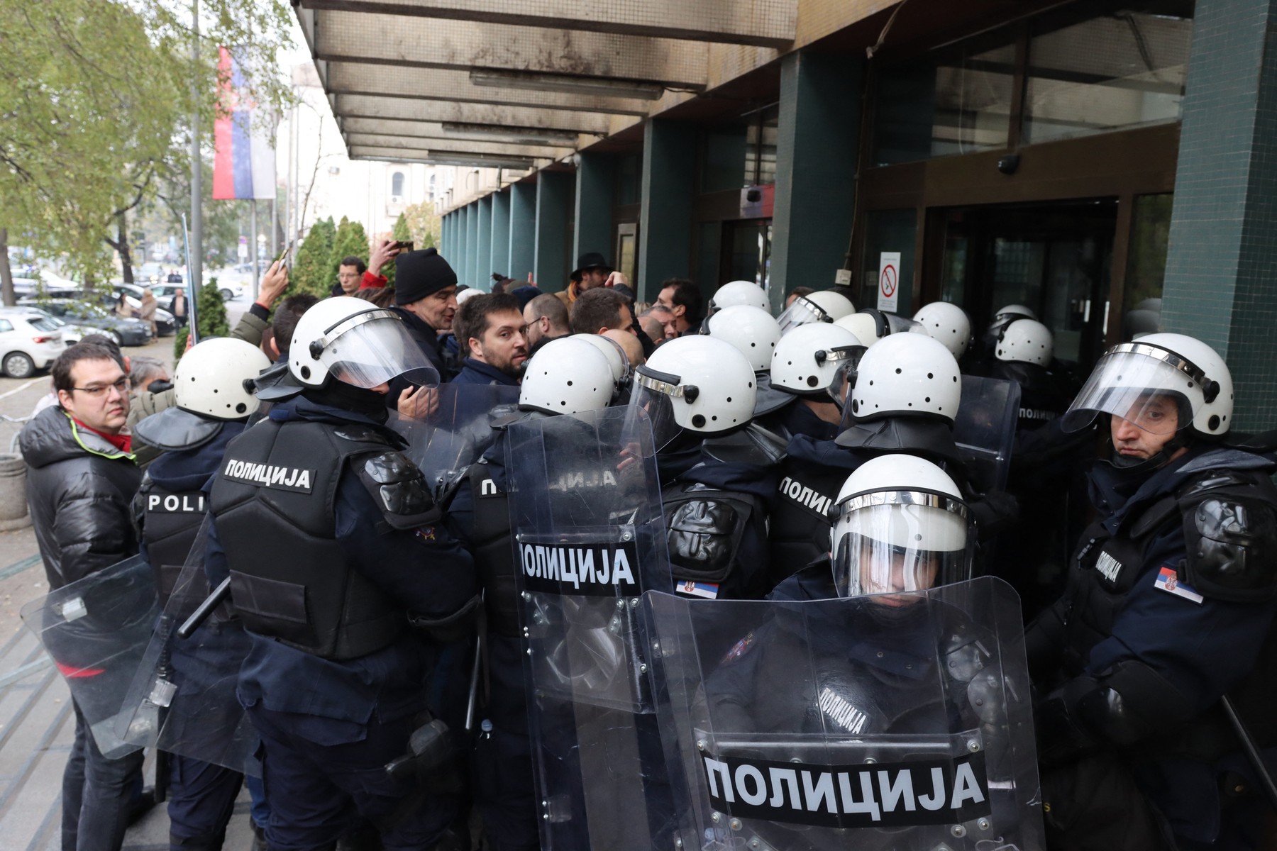 NOVI SAD, SERBIA - NOVEMBER 19: Supporters of opposition block entrance to Palace of Justice to protest fatal accident at train station killed 15 people, in Novi Sad, on November 19, 2024. Police intervene in protesters blocking the entrance. Aleksandar Savanovic / Anadolu/ABACAPRESS.COM,Image: 936321145, License: Rights-managed, Restrictions: , Model Release: no, Credit line: AA/ABACA / Abaca Press / Profimedia