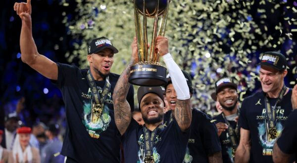 Milwaukee Bucks forward Giannis Antetokounmpo (34) yells while lifting up the NBA Cup after his team's victory in the championship game of the NBA Cup basketball tournament against the Oklahoma City Thunder Tuesday, Dec. 17, 2024, in Las Vegas. (AP Photo/Ian Maule) NBA Cup Bucks Thunder Basketball