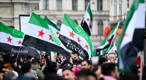 Members of the Syrian community wave Syrian flags on December 8, 2024 in Vienna, Austria and celebrate the end of Syrian dictator Bashar al-Assad's rule after rebel fighters took control of the Syrian capital Damascus overnight. Islamist-led rebels toppled Syria's longtime ruler Bashar al-Assad in a lightning offensive that a UN envoy called "a watershed moment" for the nation marred by civil war.,Image: 944395535, License: Rights-managed, Restrictions: Austria OUT / SOUTH TYROL OUT, Model Release: no, Credit line: MAX SLOVENCIK / AFP / Profimedia