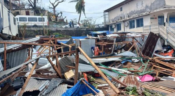 This photograph shows a pile of debris of metal sheets and wood after the cyclone Chido hit France's Indian Ocean territory of Mayotte, on December 14, 2024 in the capital Mamoudzou. At least 14 people were killed in Mayotte when a fierce cyclone battered the French Indian Ocean territory, authorities said on December 15, 2024, with officials warning it will take days to know the full toll.,Image: 946966209, License: Rights-managed, Restrictions: , Model Release: no, Credit line: Daniel MOUHAMADI / AFP / Profimedia