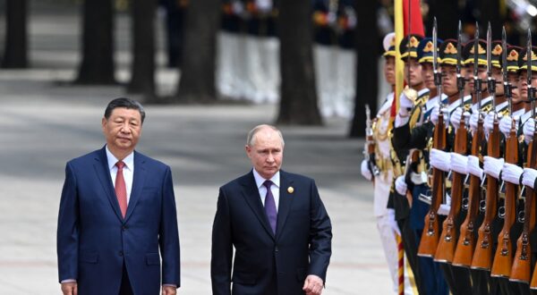 In this pool photograph distributed by the Russian state agency Sputnik, Russia's President Vladimir Putin and China's President Xi Jinping attend an official welcoming ceremony in front of the Great Hall of the People in Tiananmen Square in Beijing on May 16, 2024.,Image: 873449185, License: Rights-managed, Restrictions: ** Editor's note : this image is distributed by Russian state owned agency Sputnik **, Model Release: no, Credit line: Sergei BOBYLYOV / AFP / Profimedia