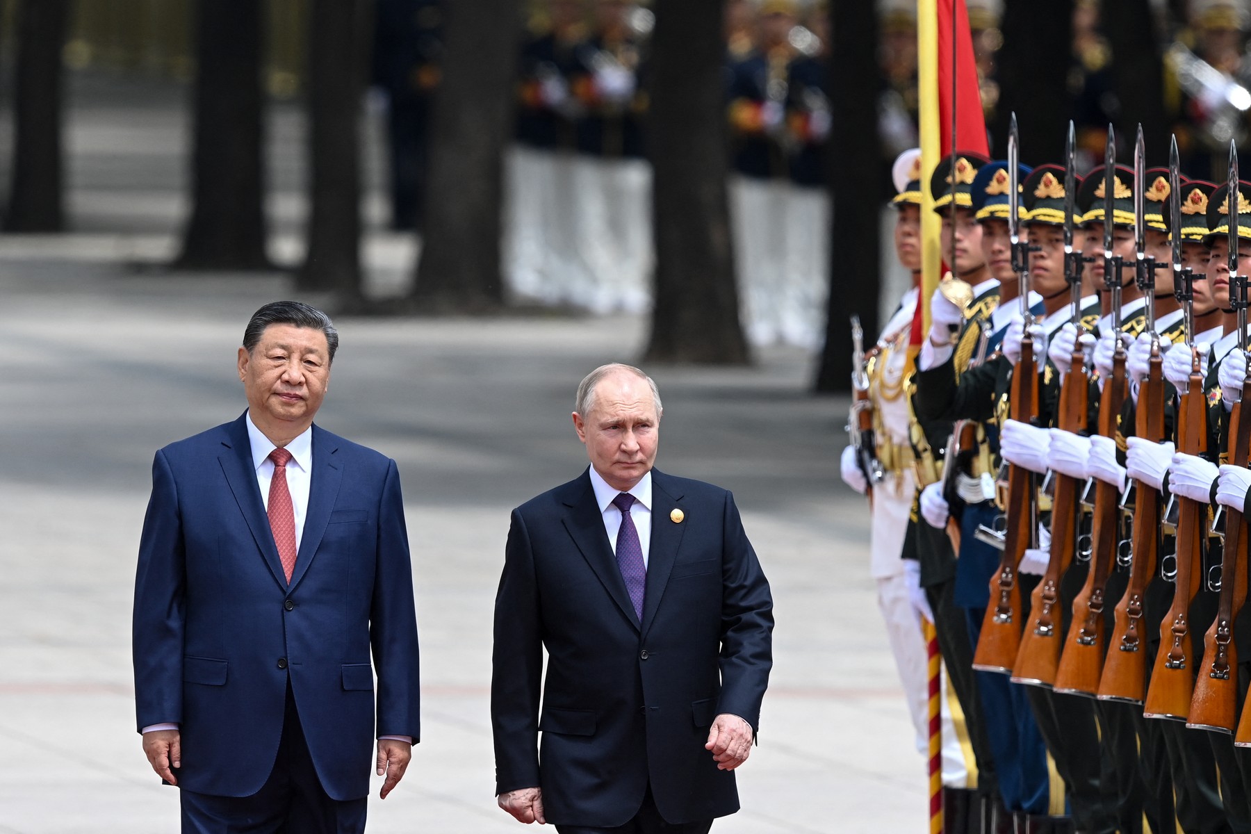 In this pool photograph distributed by the Russian state agency Sputnik, Russia's President Vladimir Putin and China's President Xi Jinping attend an official welcoming ceremony in front of the Great Hall of the People in Tiananmen Square in Beijing on May 16, 2024.,Image: 873449185, License: Rights-managed, Restrictions: ** Editor's note : this image is distributed by Russian state owned agency Sputnik **, Model Release: no, Credit line: Sergei BOBYLYOV / AFP / Profimedia
