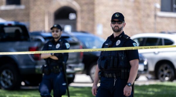 MADISON, WISCONSIN - JULY 5: Police stand guard outside of Sherman Middle School where US President Joe Biden held a rally on July 5, 2024 in Madison, Wisconsin. Following the rally Biden was expected to sit down for a network interview which is expected to air during prime time as the campaign scrambles to do damage control after Biden's poor performance at last week's debate.   Jim Vondruska,Image: 887595591, License: Rights-managed, Restrictions: , Model Release: no, Credit line: Jim Vondruska / Getty images / Profimedia