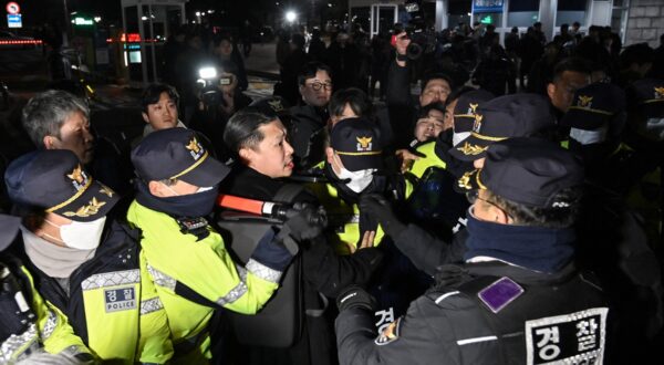 Police attempt to hold back people trying to enter the National Assembly in front of the main gate of the National Assembly in Seoul, South Korea on December 3, 2024, after President Yoon Suk Yeol declared emergency martial law.  South Korea's President Yoon Suk Yeol on December 3 declared emergency martial law, saying the step was necessary to protect the country from "communist forces" amid parliamentary wrangling over a budget bill.,Image: 942460693, License: Rights-managed, Restrictions: , Model Release: no, Credit line: JUNG YEON-JE / AFP / Profimedia