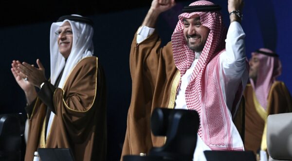 Asian Football Confederation (AFC) President Sheikh Salman bin Ibrahim al-Khalifa (L) and Saudi Arabia's Minister of Sports and Youth Abdulaziz bin Turki al-Faisal al-Saud celebrate after Saudi Arabia was confirmed as host of the 2034 World Cup during a ceremony in the capital Riyadh on December 11, 2024. Saudi Arabia was confirmed as host of the 2034 World Cup by FIFA on December 11, underlining the Gulf kingdom's growing influence in world sport despite criticism of the country's human rights record.,Image: 945537740, License: Rights-managed, Restrictions: , Model Release: no, Credit line: AFP / AFP / Profimedia