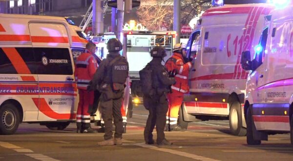 Police and ambulances stand next to the Christmas market, where a car crashed into a crowd injuring between "60 and 80 people", according to a spokesman for the local rescue service, on December 20, 2024 in Magdeburg, eastern Germany.  
  According to the emergency service, several people were "severely" injured", the spokesman said. German media reported one person had died, although that was not yet confirmed by authorities.,Image: 948896897, License: Rights-managed, Restrictions: , Model Release: no, Credit line: NEWS5 / AFP / Profimedia