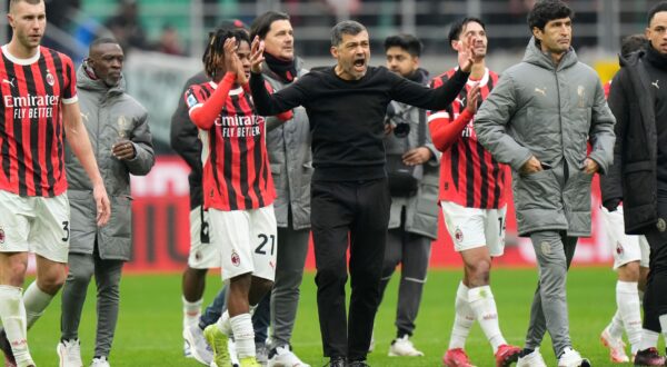 AC Milan's head coach Sergio Conceicao celebrates at the end of a Serie A soccer match between AC Milan and Parma, at the San Siro stadium in Milan, Italy, Sunday, Jan. 26, 2025. (AP Photo/Luca Bruno) Italy Soccer Serie A