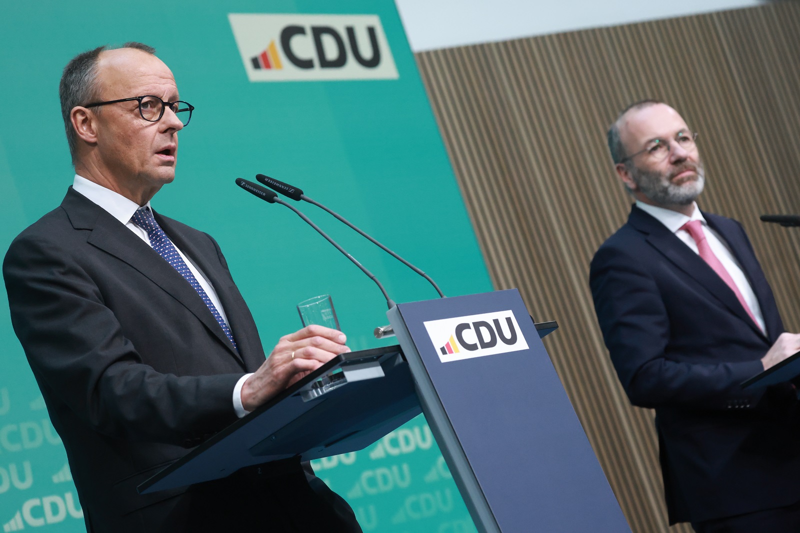 epa11833228 Chairman of the Christian Democratic Union (CDU) party and faction Friedrich Merz (L) and European People’s Party (EPP) president Manfred Weber (R) attend a press conference on occasion of the European People’s Party (EPP) meeting in Berlin, Germany, 18 January 2025. The EPP Summit takes place in Berlin from 17 to 18 January 2025.  EPA/CLEMENS BILAN