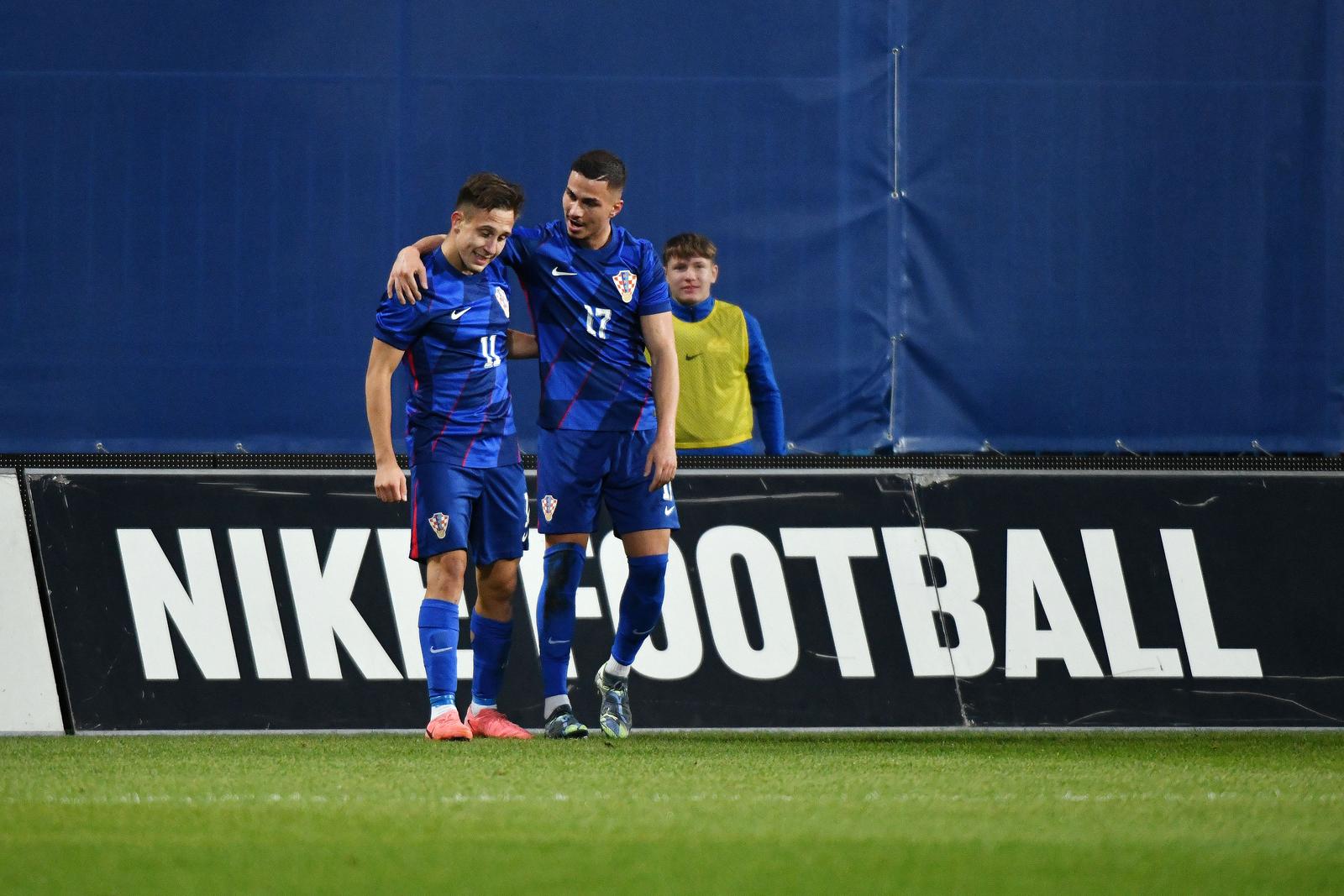 15.10.2024., Gradski stadion Ivan Kusek Apas, Koprivnica - Kvalifikacije za UEFA Europsko U-21 prvenstvo, skupina G, Hrvatska - Grcka. Nogometasi Hrvatske slave pogodak Lukasa Kacavende za vodstvo 1:0. Lukas Kacavenda, Franjo Ivanovic Photo: Vjeran Zganec Rogulja/PIXSELL