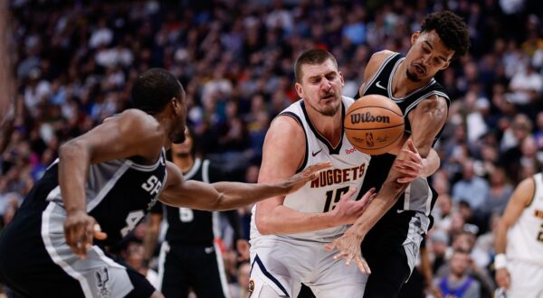Jan 3, 2025; Denver, Colorado, USA; Denver Nuggets center Nikola Jokic (15) battles for a loose ball with San Antonio Spurs center Victor Wembanyama (1) and forward Harrison Barnes (40) in the third quarter at Ball Arena.,Image: 951671830, License: Rights-managed, Restrictions: *** Worldwide Rights Except Baltics, China, Denmark, Finland, Germany, Hong Kong, Japan, Macau, Norway, Poland, South Korea, Sweden, and Taiwan *** No sales outside your territory. No 3rd parties. No redistribution ***, Model Release: no, Credit line: Imagn Images / ddp USA / Profimedia