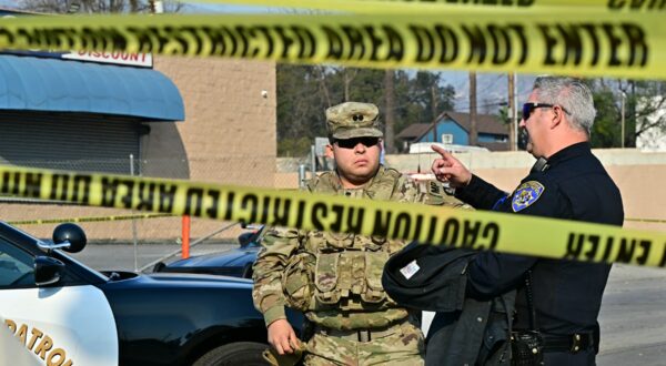 A National Guard soldier speaks with a police officer at a roadblock in Altadena, California, on January 10, 2025, during the Eaton Fire. Massive wildfires that engulfed whole neighborhoods and displaced thousands in Los Angeles have killed at least 10 people, authorities said, as California's National Guard soldiers readied to hit the streets to help quell disorder.
News of the growing toll, announced late Thursday January 9 by the Los Angeles County Medical Examiner, came as swaths of the United States' second-largest city lay in ruins.,Image: 952788954, License: Rights-managed, Restrictions: , Model Release: no, Credit line: Frederic J. Brown / AFP / Profimedia