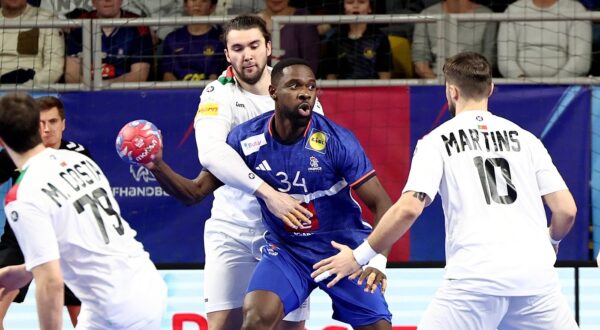 France's left back # 34 Karl Konan (C) fights for the ball with Portugal's center half #10 Miguel Martins (2nd L)  during a friendly handball match between France and Portugal at the Rhenus Stadium in Strasbourg, eastern France, on January 10, 2025.,Image: 952822384, License: Rights-managed, Restrictions: , Model Release: no, Credit line: FREDERICK FLORIN / AFP / Profimedia