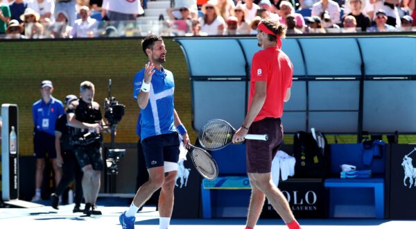 Serbia's Novak Djokovic (L) shakes hands with Germany's Alexander Zverev after retiring from the men's singles semifinal on day thirteen of the Australian Open tennis tournament in Melbourne on January 24, 2025.,Image: 957112177, License: Rights-managed, Restrictions: -- IMAGE RESTRICTED TO EDITORIAL USE - STRICTLY NO COMMERCIAL USE --, Model Release: no, Credit line: Martin KEEP / AFP / Profimedia