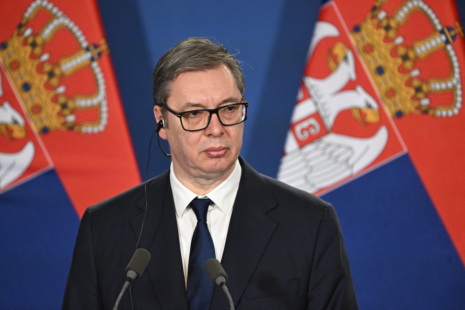 Serbian President Aleksandar Vucic listens during a joint press conference with the Hungarian Prime Minister at the Prime Minister's Office at Buda Castle in Budapest, Hungary, on February 17, 2025.   The Serbian President is decorated with the Hungarian Order of Merit’s Grand Cross with Chain, an award reserved for Hungarian and foreign heads of state, by his Hungarian counterpart Tamas Sulyok.,Image: 965233283, License: Rights-managed, Restrictions: , Model Release: no, Credit line: Attila KISBENEDEK / AFP / Profimedia