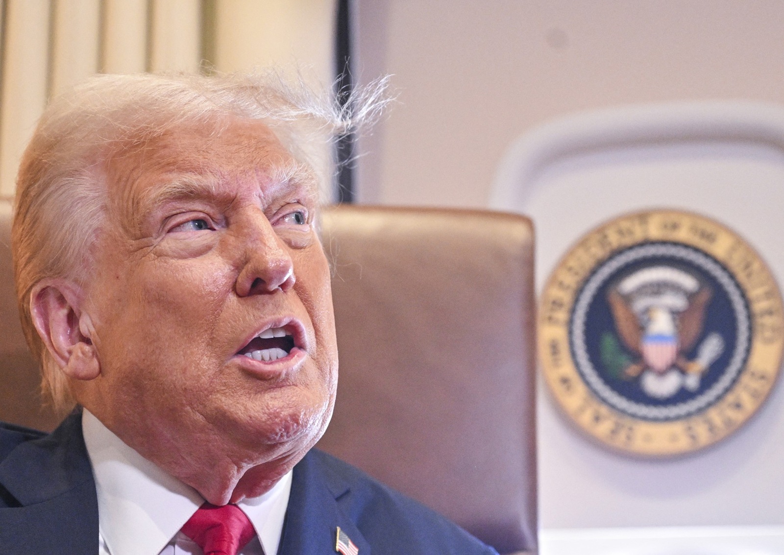US President Donald Trump speaks to the press before signing a proclamation renaming the Gulf of Mexico as the Gulf of America aboard Air Force One enroute to New Orleans, Louisiana on Febrary 09, 2025.  For years, as disputes over names on the map riled up nationalist passions in several parts of the world, US policymakers have watched warily, trying to stay out or to quietly encourage peace. Suddenly, the United States has gone from a reluctant arbiter to a nomenclature belligerent, as President Donald Trump declared that the Gulf of Mexico will henceforth be called the "Gulf of America." In an executive order signed hours after he returned to the White House, Trump called the water body an "indelible part of America" critical to US oil production and fishing and "a favorite destination for American tourism and recreation activities.",Image: 961667540, License: Rights-managed, Restrictions: , Model Release: no, Credit line: ROBERTO SCHMIDT / AFP / Profimedia