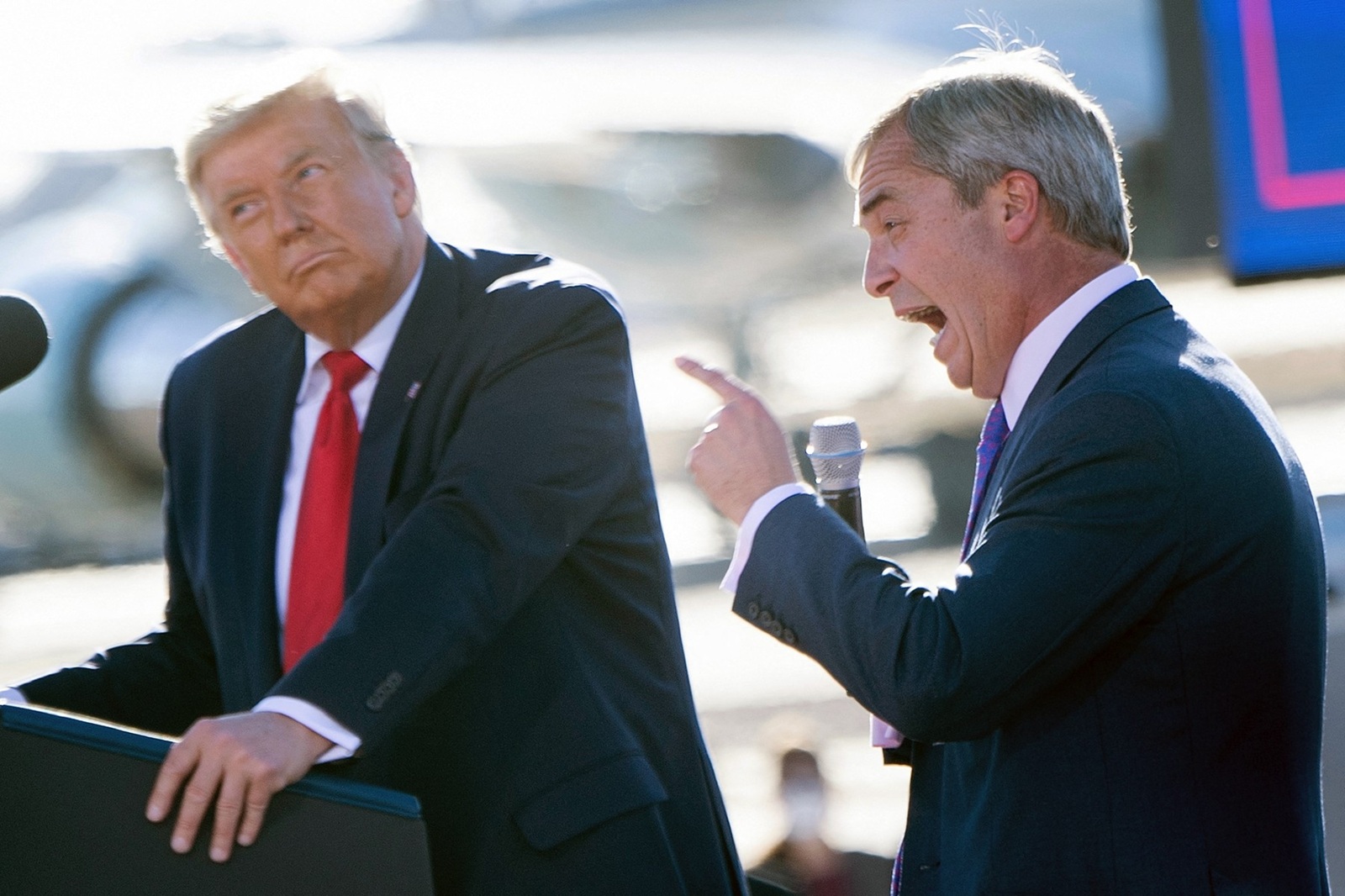 US President Donald Trump listens as Nigel Farage (R) speaks during a Make America Great Again rally at Phoenix Goodyear Airport October 28, 2020, in Goodyear, Arizona.,Image: 566111784, License: Rights-managed, Restrictions: , Model Release: no, Credit line: Brendan Smialowski / AFP / Profimedia