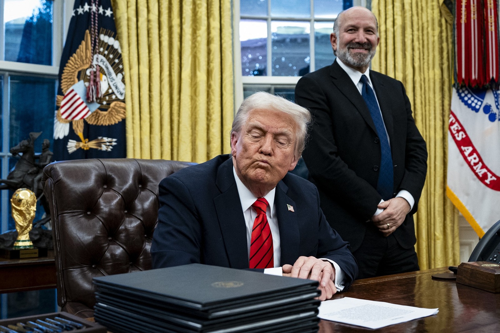 US President Donald Trump, joined by Howard Lutnick, chief executive officer of Cantor Fitzgerald LP and US commerce secretary nominee for US President Donald Trump, during an executive order signing in the Oval Office of the White House in Washington, DC, US, on Monday, Feb. 10, 2025. Trump ordered a 25% tariff on steel and aluminum imports, escalating his efforts to protect politically important US industries with levies hitting some of the country's closest allies.,Image: 962009155, License: Rights-managed, Restrictions: , Model Release: no, Credit line: Pool/ABACA / Abaca Press / Profimedia