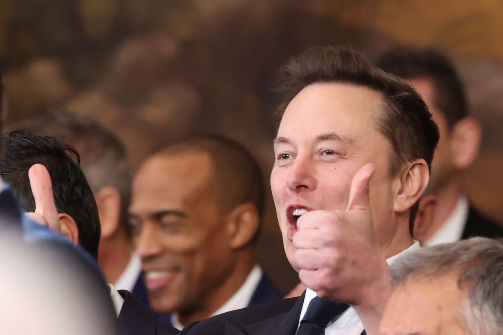 epa11839528 Tesla CEO and X owner Elon Musk gestures as U.S. President Donald Trump delivers his inaugural address on the day of his Presidential Inauguration at the Rotunda of the U.S. Capitol in Washington, DC, USA, 20 January 2025.  EPA/KEVIN LAMARQUE / POOL