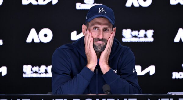 epa11848995 Novak Djokovic of Serbia talks to the media after retiring from his semifinal match against Alexander Zverev of Germany during the Australian Open at Melbourne Park in Melbourne, Australia 24 January 2025.  EPA/JAMES ROSS AUSTRALIA AND NEW ZEALAND OUT