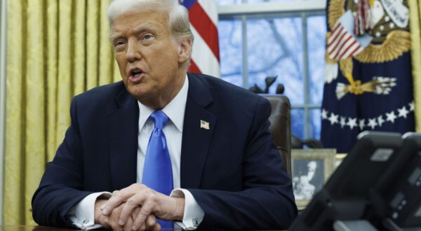 epa11889325 US President Donald J. Trump (R) gives remarks to the media in the Oval Office of the White House, as he meets with US entrepreneur and U.S. special government employee Elon Musk (L), in Washington, DC, USA, 11 February 2025.  EPA/Aaron Schwartz / POOL