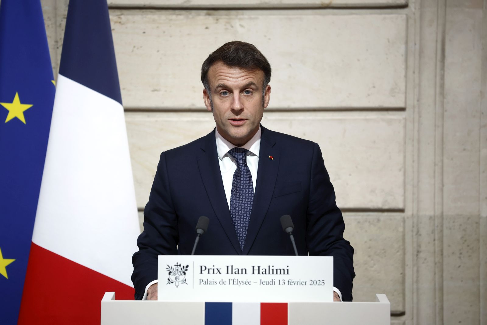 epa11893127 French President Emmanuel Macron delivers a speech during the Ilan Halimi Prize award ceremony at the Elysee Palace in Paris, France, 13 February 2025. The prize, named after the young French man of Moroccan Jewish ancestry Ilan Halimi, who was kidnapped, tortured and killed on 13 February 2006, rewards young people's commitment to combating racism and anti-Semitic prejudices and stereotypes.  EPA/YOAN VALAT / POOL
