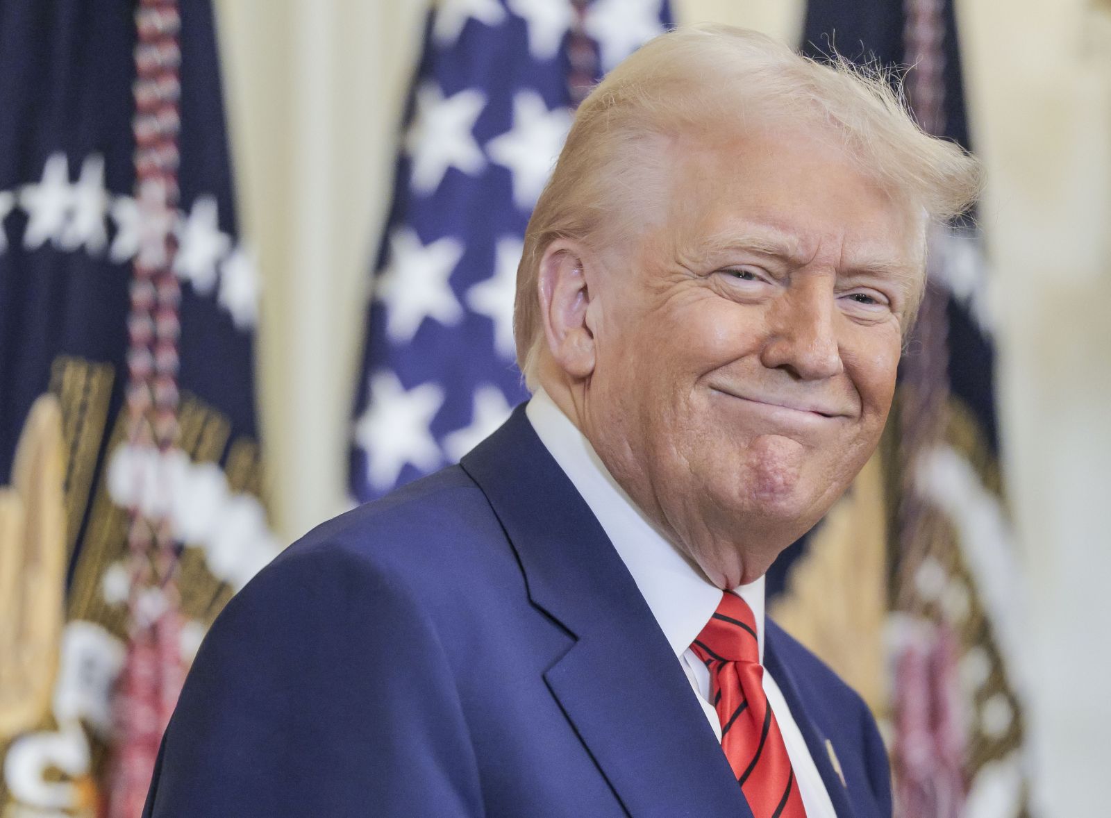 epa11911463 US President Donald J. Trump delivers remarks during a reception honoring Black History Month in the East Room of the White House in Washington, DC, USA, 20 February 2025.  EPA/SHAWN THEW / POOL