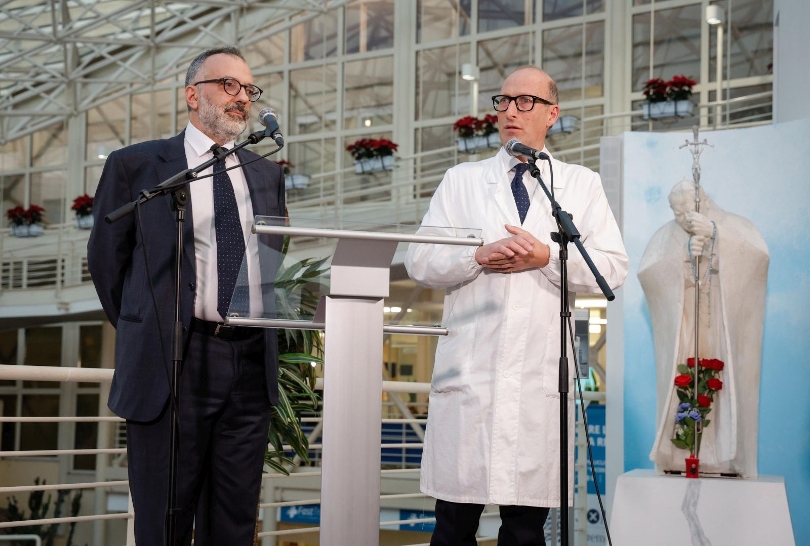 epa11913465 Luigi Carbone (L) and Sergio Alfieri speak to the press during the Pope's doctors' briefing at Gemelli University Hospital, where Pope Francis is hospitalized for bronchitis treatment, in Rome, Italy, 21 February 2025. Pope Francis was hospitalized on 14 February due to a respiratory tract infection.  EPA/GIUSEPPE LAMI