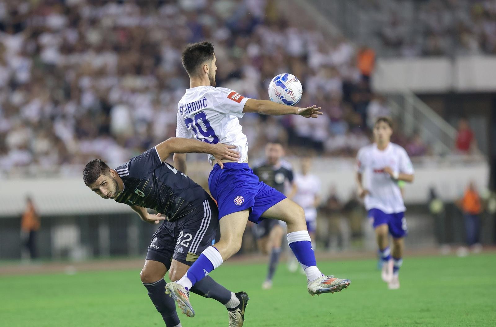 15.08.2024., stadion Poljud, Split - Uzvratna utakmica 3. pretkola kvalifikacija za UEFA Konferencijsku ligu, HNK Hajduk - MFK Ruzomberok. Simon Gabriel, Mate Antunovic Photo: Ivana Ivanovic/PIXSELL