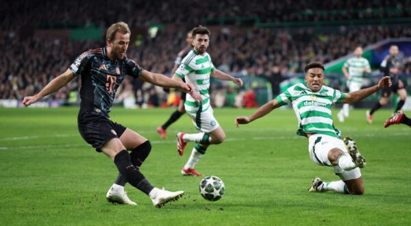 Soccer Football - Champions League - Knockout Phase Playoff - First Leg - Celtic v Bayern Munich - Celtic Park, Glasgow, Scotland, Britain - February 12, 2025 Bayern Munich's Harry Kane in action with Celtic's Auston Trusty REUTERS/Russell Cheyne Photo: RUSSELL CHEYNE/REUTERS
