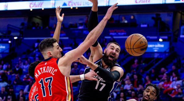 Feb 13, 2025; New Orleans, Louisiana, USA;  Sacramento Kings center Jonas Valanciunas (17) is fouled by New Orleans Pelicans center Karlo Matkovic (17) during the first half at Smoothie King Center. Mandatory Credit: Stephen Lew-Imagn Images Photo: Stephen Lew/REUTERS