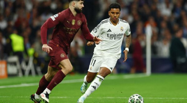 Soccer Football - Champions League - Knockout Phase Playoff - Second Leg - Real Madrid v Manchester City - Santiago Bernabeu, Madrid, Spain - February 19, 2025 Manchester City's Josko Gvardiol in action with Real Madrid's Rodrygo Action Images via Reuters/Matthew Childs Photo: Matthew Childs/REUTERS