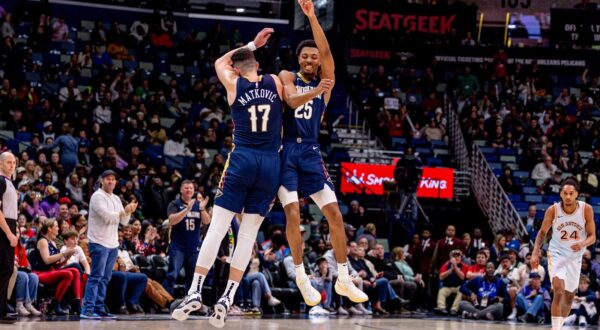 Feb 23, 2025; New Orleans, Louisiana, USA;  New Orleans Pelicans guard Trey Murphy III (25) celebrates making a three point basket with center Karlo Matkovic (17) against the San Antonio Spurs during the second half at Smoothie King Center. Mandatory Credit: Stephen Lew-Imagn Images Photo: Stephen Lew/REUTERS