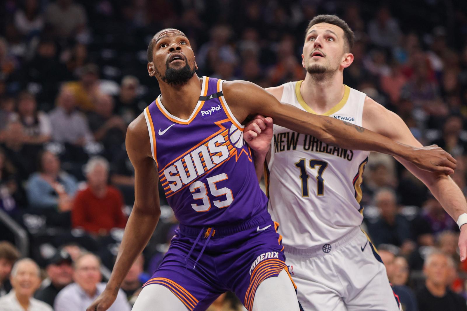 Feb 27, 2025; Phoenix, Arizona, USA; Phoenix Suns forward Kevin Durant (35) boxes out New Orleans Pelicans center Karlo Matkovic (17) in the first quarter at Footprint Center. Mandatory Credit: Brett Davis-Imagn Images Photo: Brett Davis/REUTERS