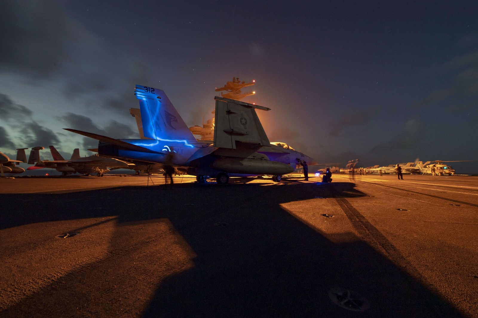 Jan 1, 2021 - Indian Ocean - Sailors inspect an F/A-18E Super Hornet, from the "Kestrels" of Strike Fighter Squadron (VFA) 137, on the flight deck of the aircraft carrier USS Nimitz (CVN 68) to provide close-air support to Operation Octave Quartz. The mission of OOQ is to relocate U.S. Department of Defense forces in Somalia to other East Africa operating locations while maintaining pressure on violent extremists and supporting partner forces.,Image: 581263251, License: Rights-managed, Restrictions: , Model Release: no, Credit line: U.S. Navy / Zuma Press / Profimedia