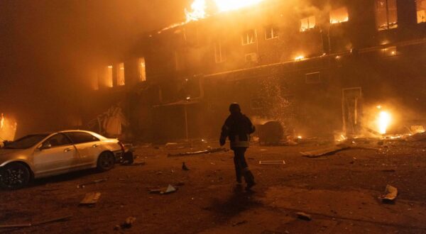 January 28, 2025, Kharkiv, Ukraine: One of the firefighter extinguishes a fire after a Russian attack on a civil factory in Kharkiv. An enemy Shahed drone hit the territory of a civilian enterprise. Previously, it was a woodworking shop. After the hit, a gas pipeline was damaged, which was used at the enterprise for production. In connection with this, a large-scale fire broke out, which spread widely. More than 12 units of the State Emergency Service, as well as equipment from the Kharkiv City Council, were involved in extinguishing the fire,' says Gladkikh. The fire completely engulfed the two-story building, a correspondent for Suspilny reports. The premises of neighboring enterprises and at least two cars that were parked nearby were also damaged. According to preliminary data, says Gladkikh, there are no injuries as a result of the explosion and fire.'There is information about two victims, they have an acute reaction to stress. But these are not employees of the enterprise, no one was here when the fire broke out. These are residents of the surrounding areas,' said the director of the department.,Image: 959576534, License: Rights-managed, Restrictions: , Model Release: no, Credit line: Yevhen Titov / Zuma Press / Profimedia