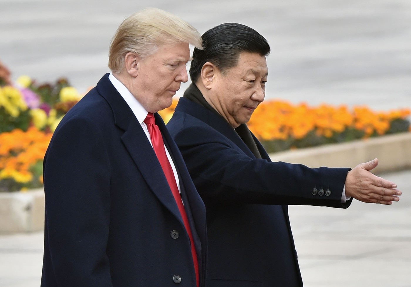 Chinese President Xi Jinping (R) escorts his U.S. counterpart Donald Trump at a welcome ceremony at the Great Hall of the People in Beijing on Nov. 9, 2017. (Kyodo)
==Kyodo,Image: 466911524, License: Rights-managed, Restrictions: , Model Release: no, Credit line: Kyodo/Newscom / Newscom / Profimedia
