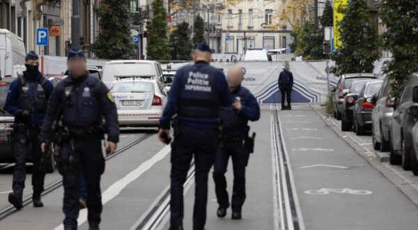 Police pictured in the Van Ooststraat/ rue Van Oost in Schaerbeek/ Schaarbeek, Brussels, where the suspected perpetrator of the attack in Brussels was shot dead during a police intervention in a cafe, Tuesday 17 October 2023. Yesterday evening, two people were killed during a shooting incident in the Ieperlaan - Boulevard d'Ypres, Brussels. The victims are two Swedish nationals who were in Brussels to support their national soccer team's match against Belgium's Red Devils.
BELGA PHOTO JAMES ARTHUR GEKIERE,Image: 814349506, License: Rights-managed, Restrictions: , Model Release: no, Credit line: JAMES ARTHUR GEKIERE / AFP / Profimedia