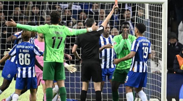 Sporting Lisbon's Ivorian defender #26 Ousmane Diomande (2R) is shown a red card during the Portuguese League football match between FC Porto and Sporting Lisbon at the Dragao stadium in Porto, on February 7, 2025.,Image: 961097453, License: Rights-managed, Restrictions: , Model Release: no, Credit line: MIGUEL RIOPA / AFP / Profimedia