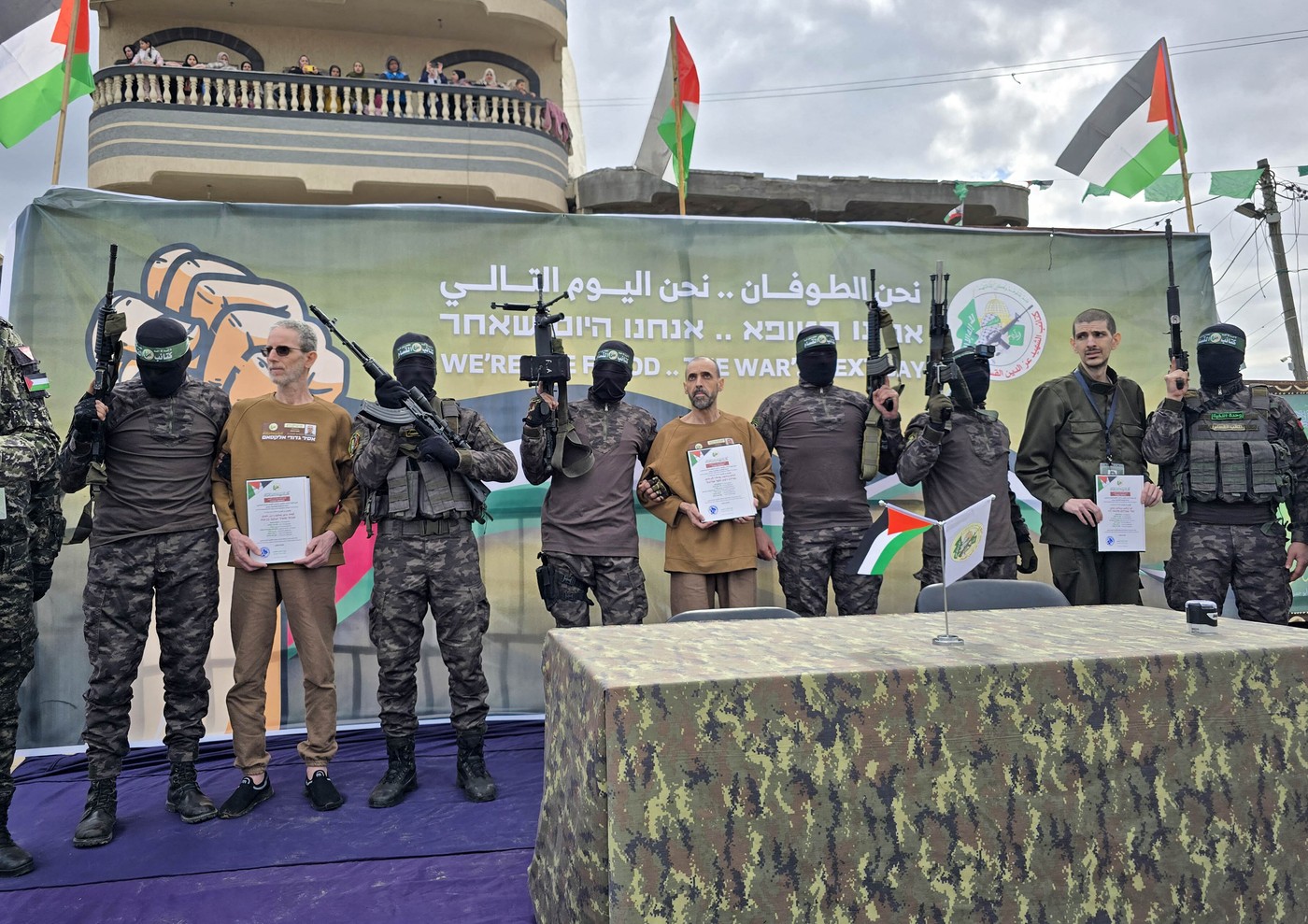DEIR AL BALAH, GAZA - FEBRUARY 8: Al-Qassam Brigades, the armed wing of Hamas, hand over Israeli hostages Or Levy, Eliyahu Sharabi, and Ohad Ben Ami to the International Committee of the Red Cross on Saturday as part of the ongoing hostage swap in Deir al Balah, Gaza, on February 8, 2025. Ashraf Amra / Anadolu/ABACAPRESS.COM,Image: 961233251, License: Rights-managed, Restrictions: , Model Release: no, Credit line: AA/ABACA / Abaca Press / Profimedia
