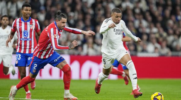 Kylian Mbappe of Real Madrid and Jose Maria Gimenez of Atletico de Madrid during the Spanish championship La Liga football match between Real Madrid and Atletico de Madrid on February 8, 2025 at Santiago Bernabeu stadium in Madrid, Spain - Photo Oscar J Barroso / Spain DPPI / DPPI,Image: 961509417, License: Rights-managed, Restrictions: Hungary Out, Model Release: no, Credit line: Oscar Barroso / AFP / Profimedia
