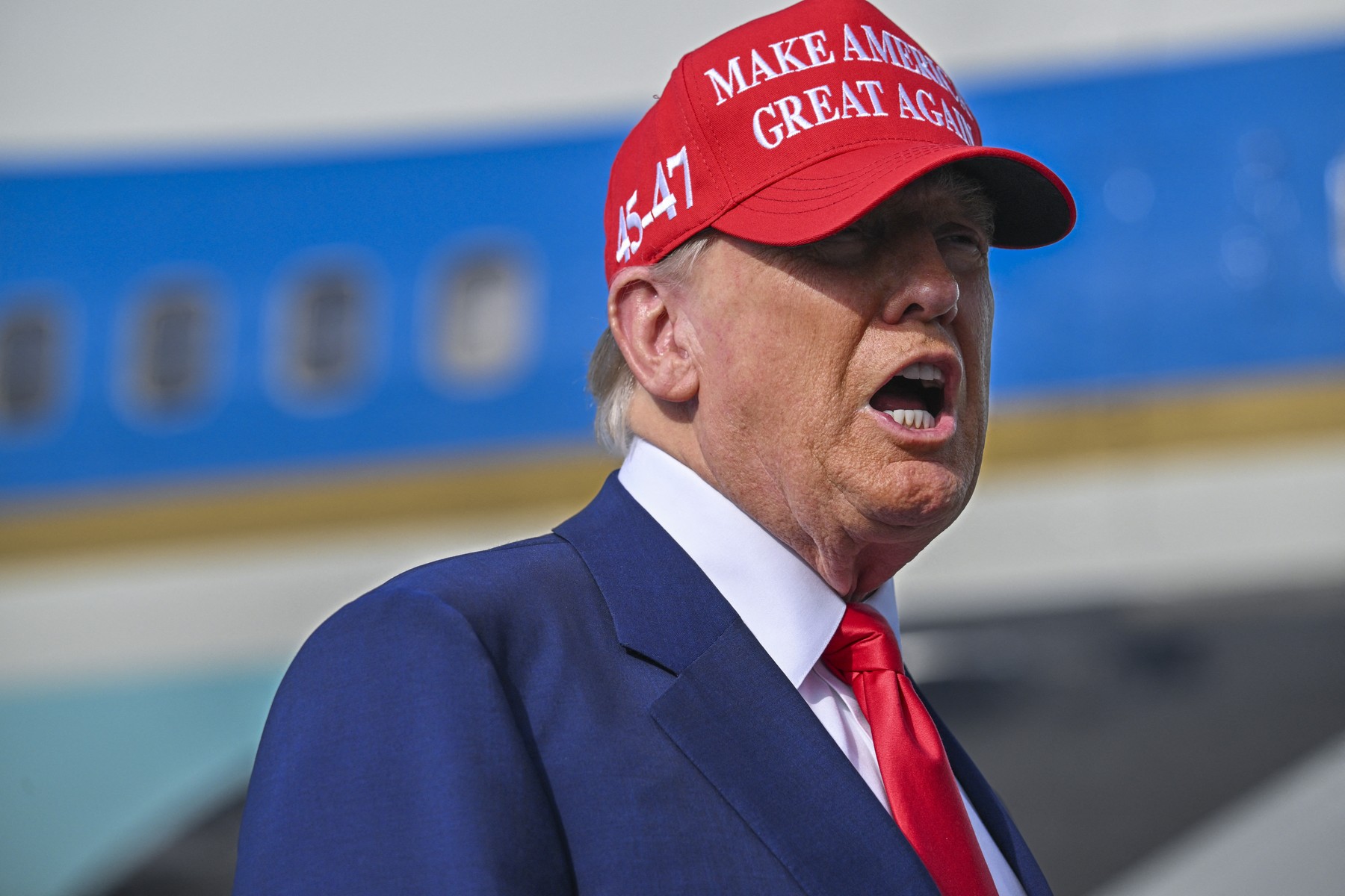 US President Donald Trump speaks to reporters after landing at the Palm Beach International Airport in West Palm Beach, Florida on February 16, 2025 after attending the Daytona 500 car race earlier in the day. US President Donald Trump said Sunday he could meet "very soon" with Vladimir Putin, adding he believes his Russian counterpart genuinely wants to stop fighting in Ukraine.,Image: 964922869, License: Rights-managed, Restrictions: , Model Release: no, Credit line: ROBERTO SCHMIDT / AFP / Profimedia