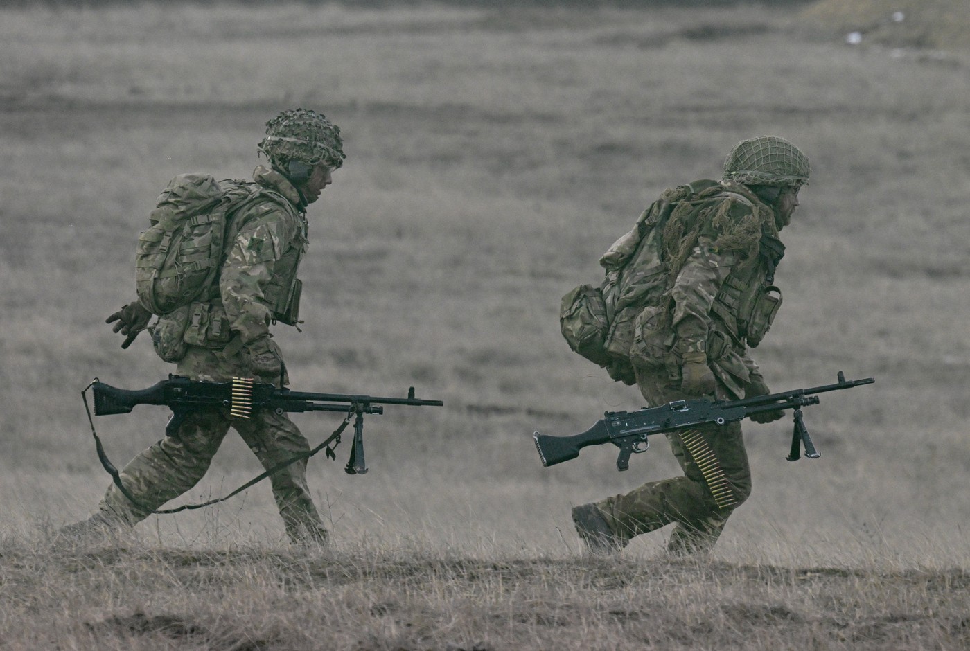NATO military forces participate in the “Exercise Steadfast Dart 2025” at the Smardan Training Area in Smardan, south-eastern Romania, on February 19, 2025.  The exercise is the first large-scale deployment of the ARF since its establishment past year and is aimed to test the deployable capabilities and procedures as well as the interoperability among the troop contributors and host nations. The exercise is set to demonstrate0 NATO’s ability to rapidly deploy forces from Europe to reinforce the defence of its eastern flank. This reinforcement will occur during a simulated emerging conflict scenario with a near-peer adversary, showing the ARF capability to conduct and sustain complex operations across thousands of kilometers and in any condition. Approximately 10.000 personnel from 9 Allies and including air, land, maritime and special operation forces will participate. STDT25 will be carried out in Romania, Bulgaria and Greece with the host nations' support to demonstrate NATO’s responsiveness in delivering significant deterrence effects. Live capability demonstrations will be conducted including amphibious operations, live-fire air power and combined maneuvers across all domains.,Image: 966106192, License: Rights-managed, Restrictions: , Model Release: no, Credit line: Daniel MIHAILESCU / AFP / Profimedia