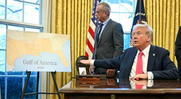 US President Donald Trump points a a map reading "Gulf of America" as he speaks to the press after signing an Executive Order, alongside US Secretary of Health and Human Services Robert F. Kennedy Jr. (L), at the Oval Office of the White House in Washington, DC on February 25, 2025. Trump signed an executive order on price transparency requirements on the health care industry to reinstate and strengthen them. He also signed an order on the supply of copper and foreign copper in the American market, the order charges Lutnick with looking at process to potentially impose tariffs or trade barriers.,Image: 968841888, License: Rights-managed, Restrictions: , Model Release: no, Credit line: Jim WATSON / AFP / Profimedia