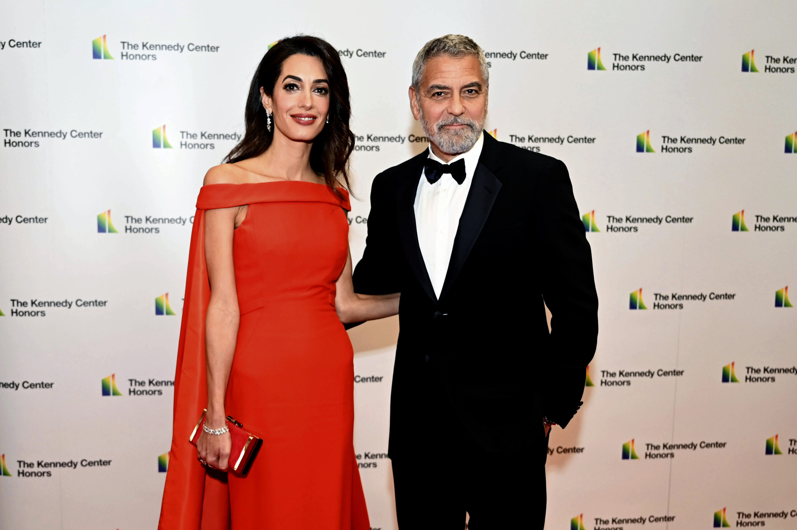 2022 Kennedy Center Honoree actor George Clooney and his wife, Amal Clooney, arrive at the State Department for the Kennedy Center Honors gala dinner, Saturday, Dec. 3, 2022, in Washington. (AP Photo/Kevin Wolf)