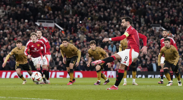 March 13, 2025, Manchester: Manchester, England, 13th March 2025. Bruno Fernandes of Manchester United scoring the equalising penalty during the UEFA Europa League match Manchester United v Real Sociedad at Old Trafford, Manchester. (Credit Image: Â© Andrew Yates/Sportimage/Cal Sport Media) (Cal Sport Media via AP Images)